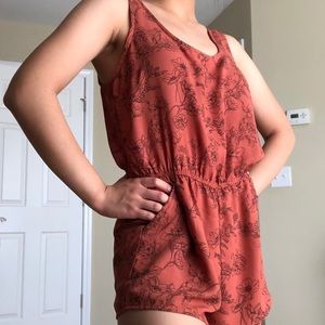 rust orange floral romper